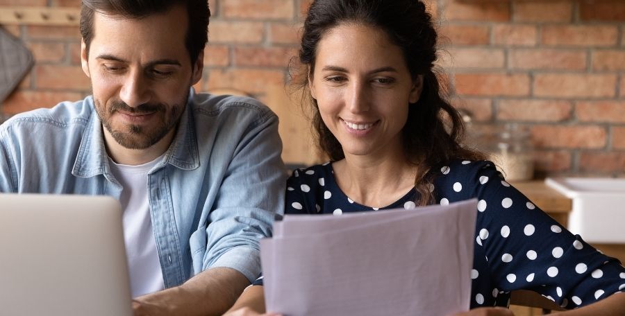 Couple Viewing Monthly Mortgage Payment