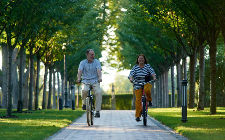 Retired couple enjoying retirement using reverse mortgage.